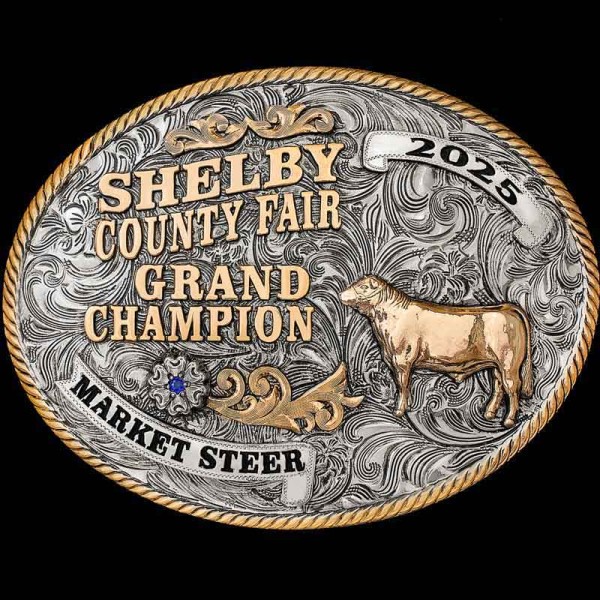 "If you're lookin' for a classic Cowboy Buckle, you've found it! Our Ogden Classic is crafted on a German Silver base with an antique finish to give a rustic feel. There are many traditional elements on this buckle such as the Jeweler's Bronze rope e
